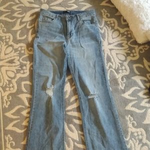Mid rise lightly distressed flare jeans
